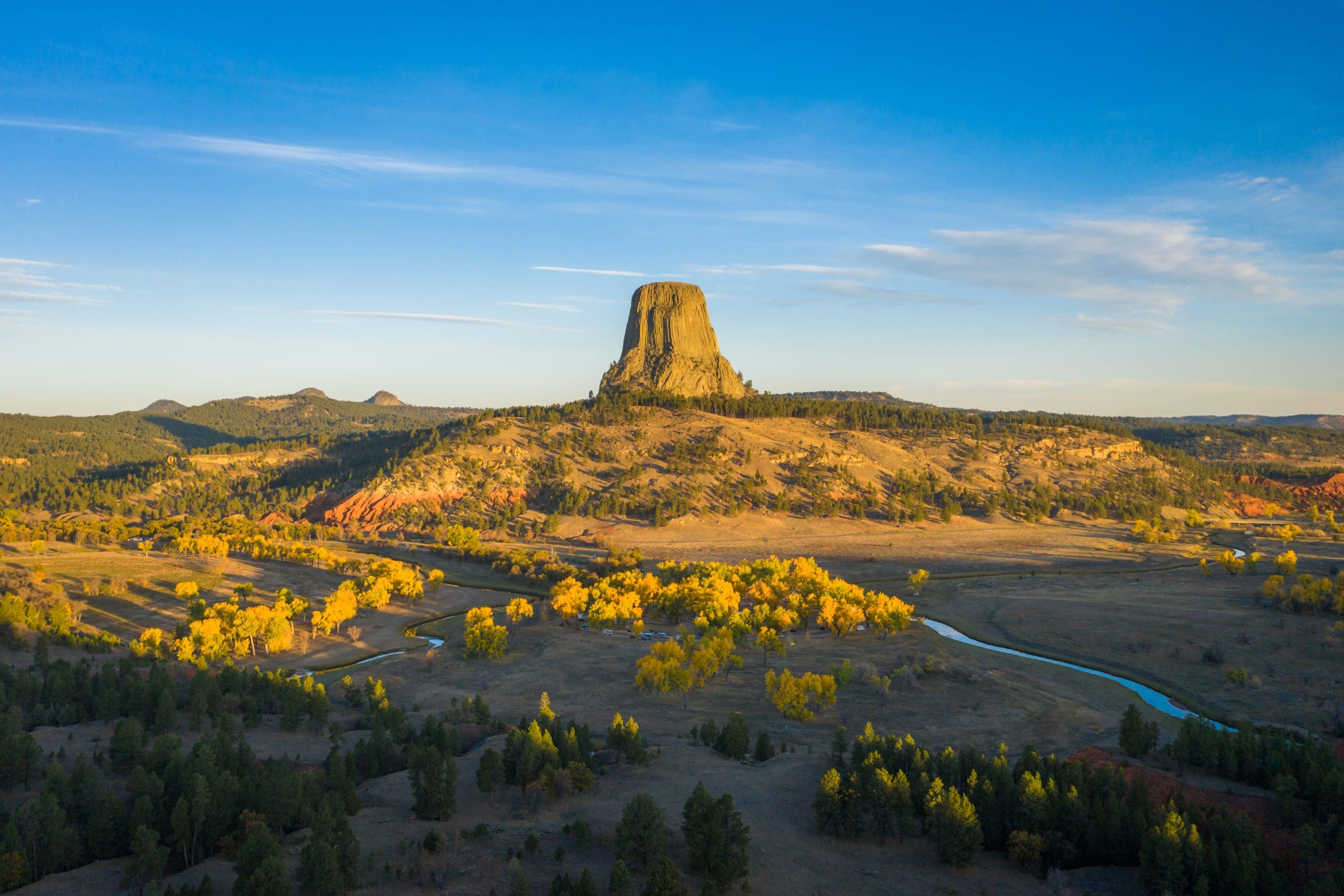 Devils Tower Butte and Belle Fourche River in Sunny Autumn Morni